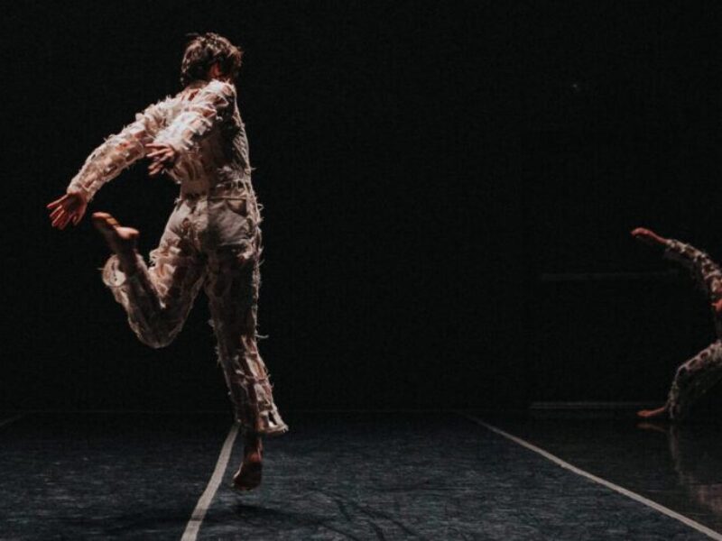 A photo of dancers on a stage.