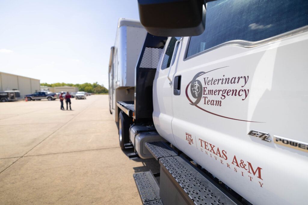 A photo of a truck with the Veterinary Emergency Team logo on the door.