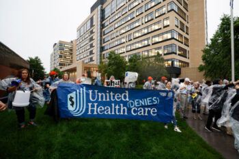 MINNETONKA, MINNESOTA - JULY 15: Health care advocates face arrest while protesting denials of care at UnitedHealthcare on July 15, 2024 in Minnetonka, Minnesota. (Photo by David Berding/Getty Images for the People's Action Institute)