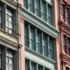 A photo of a building facade in the neighborhood of Soho in New York City.