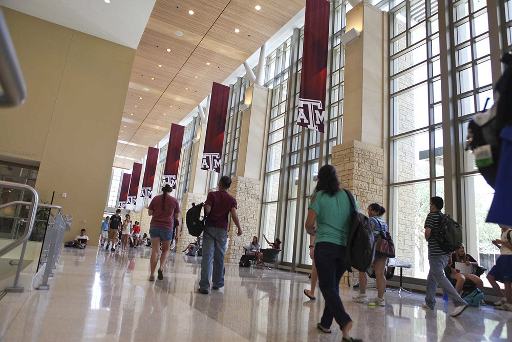 students walk through the 12th man hallway on the campus of Texas A&M University