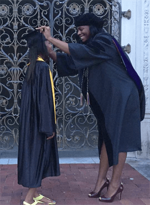 Kristinia Anderson and her daughter on graduation day