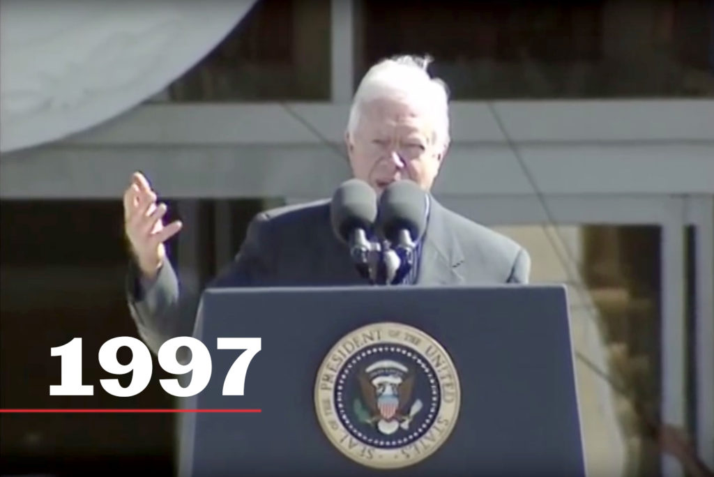 President Jimmy Carter delivers his remarks during the opening of the George H.W. Bush Presidential Library and Museum in 1997.