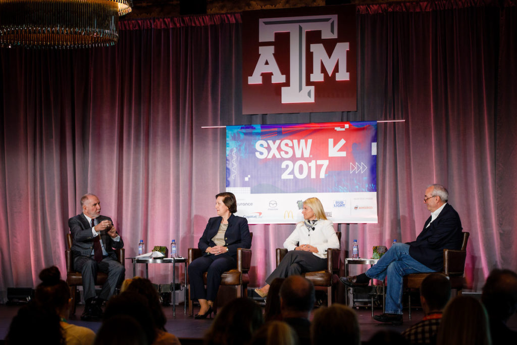 Texas A&M President Michael K. Young leads a discussion on academic incubators.
