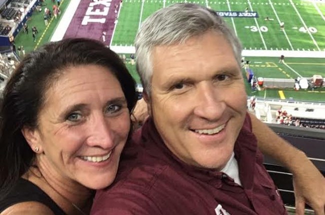 Rodney and Shelly Moss at an Aggie football game