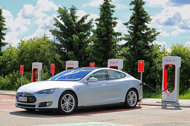 Tesla Model S is being charged at Tesla Supercharger station. (Shutterstock)