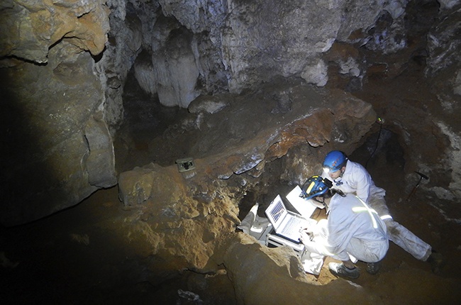 Researchers at work in Rising Star cave.