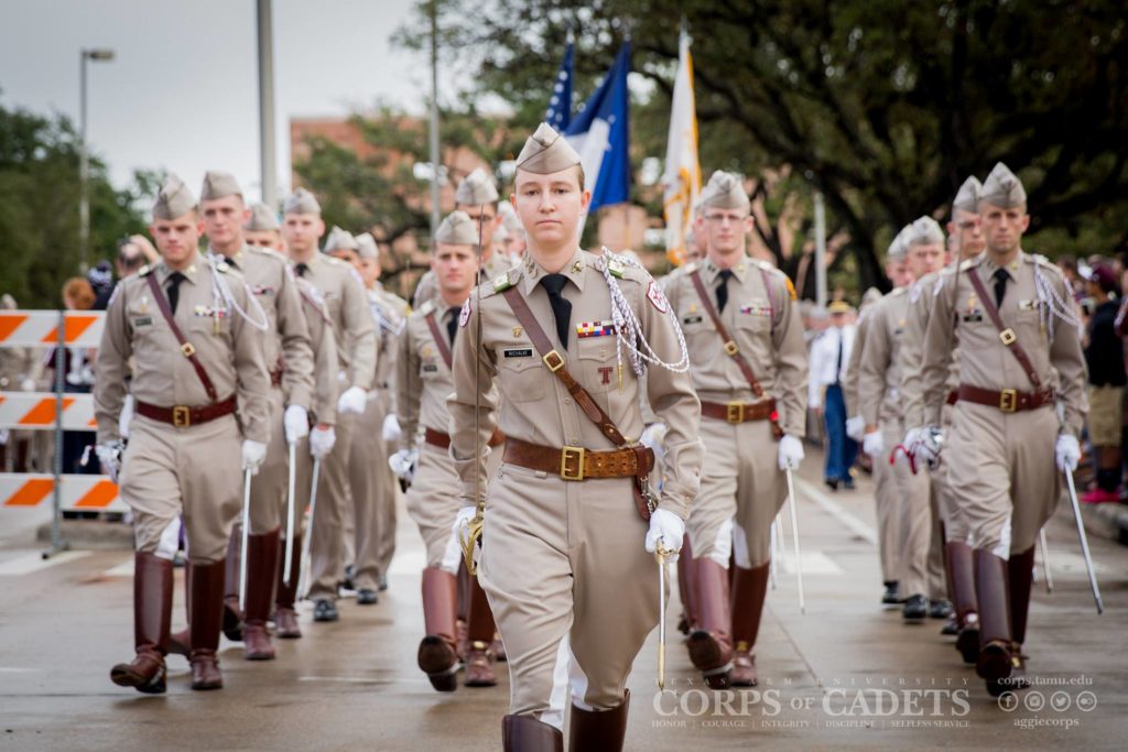 Alyssa Michalke leading the Corps of Cadets march through campus
