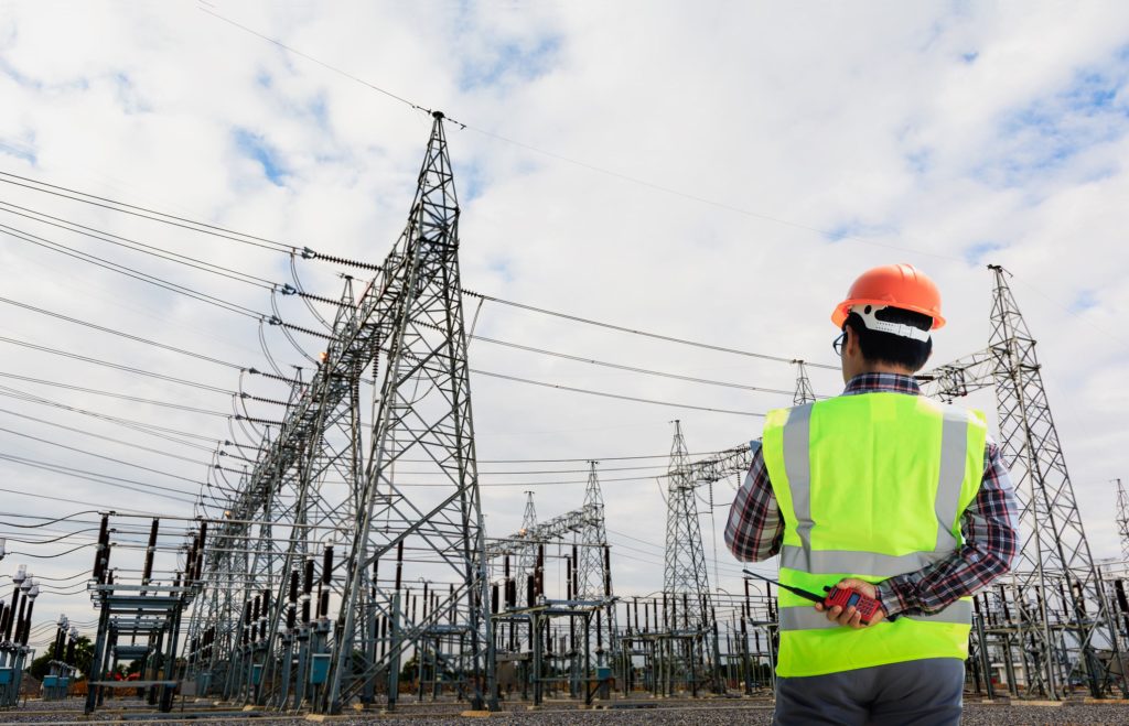 Engineer examines power grid