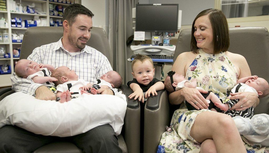 Daniel Hodges, a veteran and third-year medical student at Texas A&amp;M College of Medicine, and his wife, Liz, welcomed quintuplets into the world March 24. (Jay Janner/Austin American Statesman)