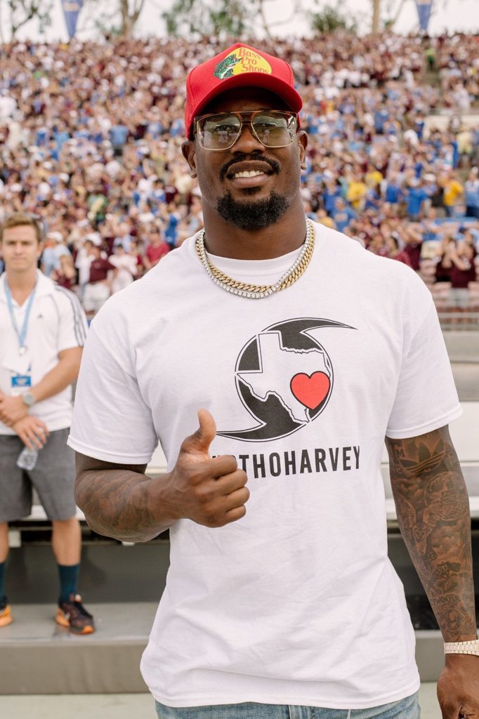 Former Aggie linebacker Von Miller wore a #BTHOHarvey t-shirt on the sidelines at the Texas A&M vs. UCLA football game Sunday night. 