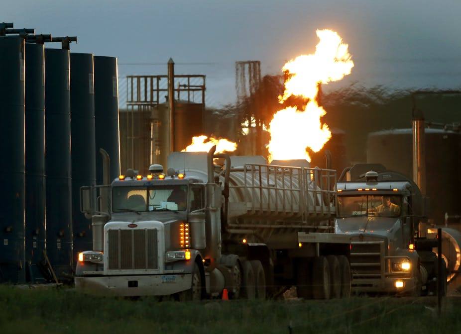 Fracking has led to an increase in truck traffic, one of the reasons for worsening trends on air quality in areas with oil and gas drilling. (AP Photo/Charles Rex Arbogast)