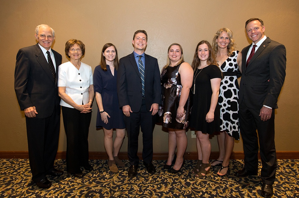 Jim and Betty Sitton (far left) and Jennifer '97 and Ryan Sitton '97 (far right) bookend the inaugural Sitton Award recipients (from left) Falyn Knebel '18, Anthony Rasp '18, Lindsey Ray '18 and Stephanie DiCarlo '18 at the 2018 College of Science Spring Recognition and Awards Dinner. (Texas A&M University College of Science)