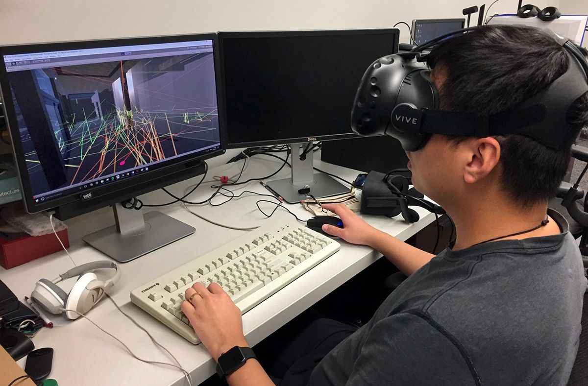 Jing Du uses virtual reality software to explore a digital building. (Texas A&M University College of Architecture)