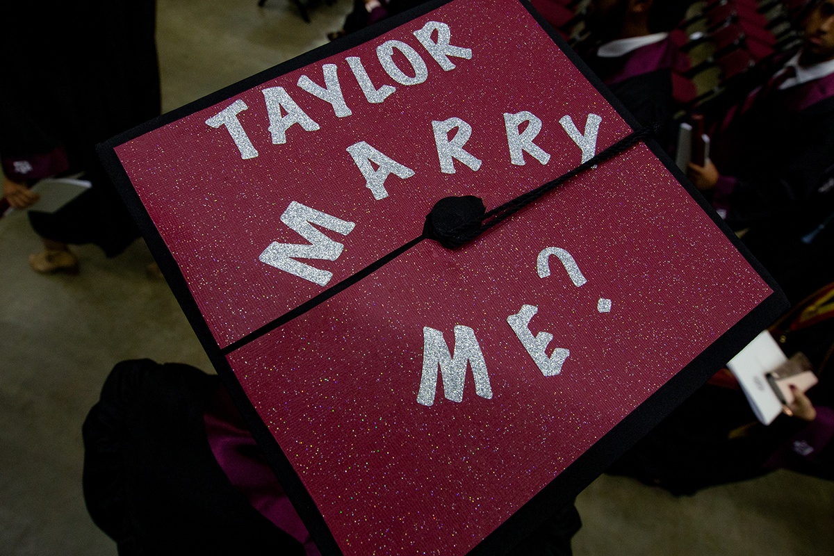Jonathan Cox's cap reading "Taylor Marry Me?"