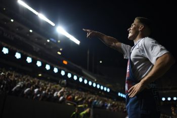 yell leader points into the stands at midnight yell