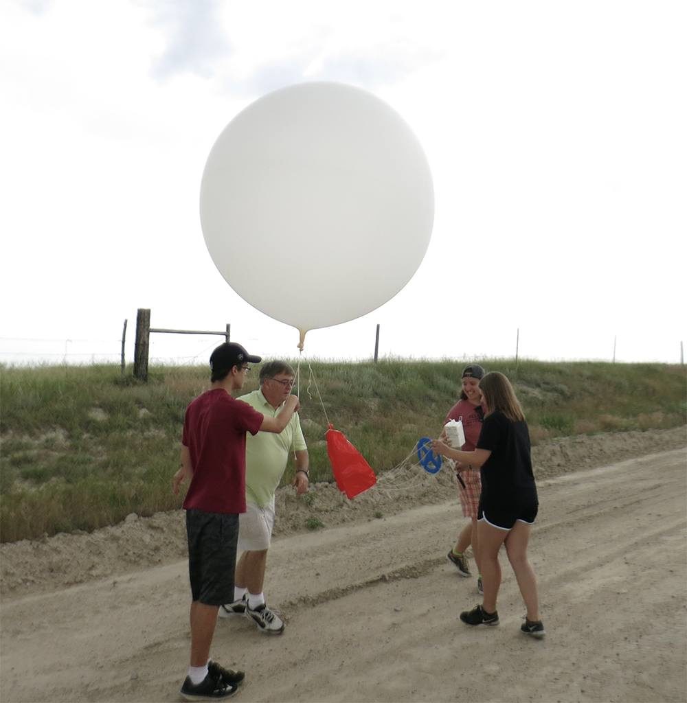 Texas A&M students release a weather balloon into the sky. (Texas A&M Geosciences)
